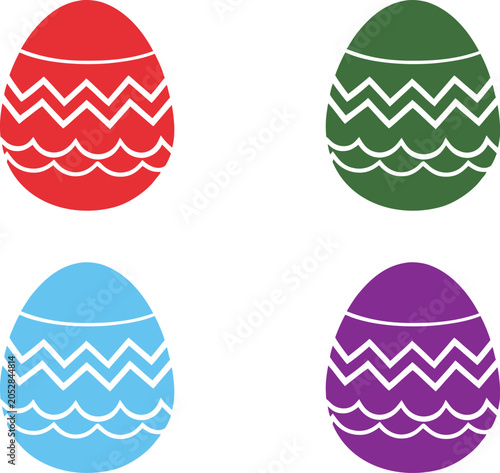 Four colorful easter eggs with decorative patterns in red green blue and purple