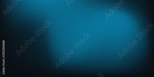 Abstract gradient of deep blue to black with soft light highlights