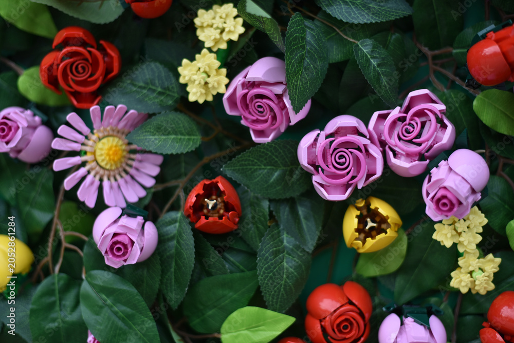 Naklejka premium Background with Lego flowers