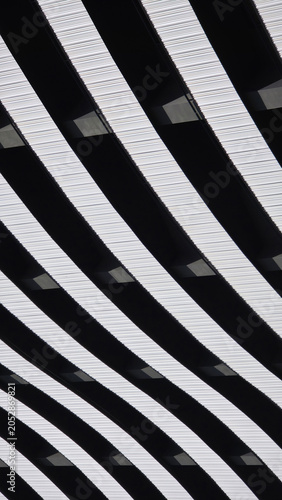 Modern architecture creating abstract black and white striped pattern