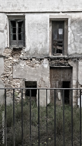 Abandoned building facade showing decay and neglect