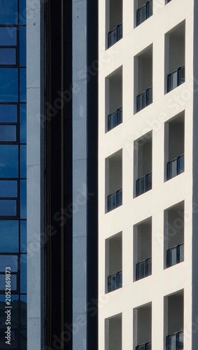 Modern building facades displaying abstract geometric patterns