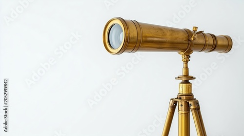 Antique brass telescope on wooden tripod in clean product photography style isolated on white background for nautical history education banner