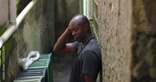 Obraz na plátne Florist looking frustrated in alley, small business owner outdoors in urban sett