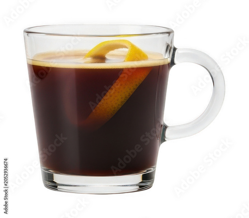 Rich espresso coffee in a clear glass mug with a citrus lemon zest twist isolated transparent background image