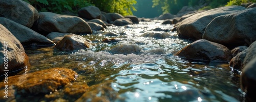 Crystal clear creek water flows over smooth stones, sunlight dappling the surface, creating mesmerizing reflections and ripples A tranquil scene of nature's beauty , bubbles, oxygen, river