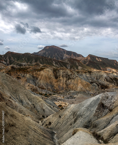 Beautiful landscape of canyon and mountains on background dramatic sky, Tabernas, Almeria, Spain