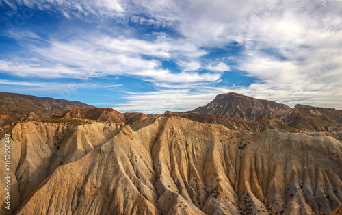 Beautiful landscape of canyon and mountains on background dramatic sky, Tabernas, Almeria, Spain
