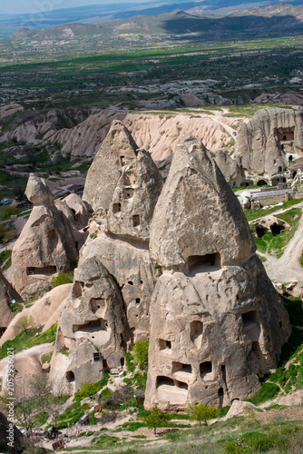 Uchisar Castle and fairy chimney rock formations in Cappadocia.