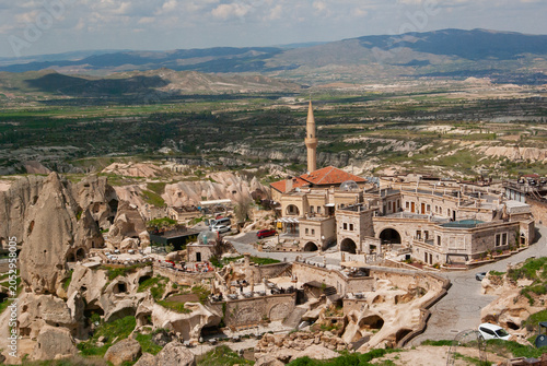 Uchisar Castle and fairy chimney rock formations in Cappadocia.