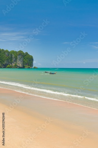 Thailand - Krabi - Ao Nang Beach July 27th 2025. This was on a beautiful morning during the wet season. The Andaman sea during the low season surrounded by beautiful mountains.
