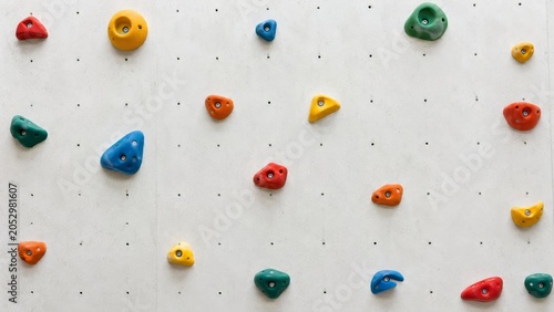 Indoor climbing holds mockup indoor boulder gym wall for perimenopause sport, active aging fitness and bouldering training