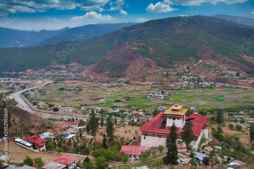 View over Paro Dzong and famous Paro Valley surrounded by Himalayas mountain
