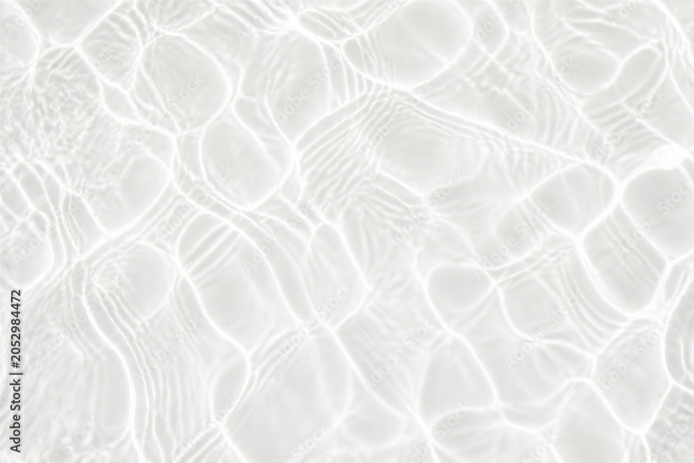 Fototapeta premium Shallow water ripple pattern with bright light reflections