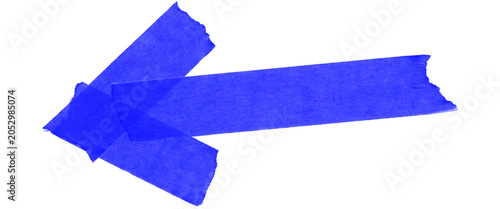 Blue masking tape arrow pointing left, textured paper adhesive strips on white background, handmade directional sign for creative design
