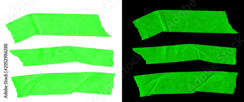 Foto Neon green masking tape strips, vibrant adhesive paper tape set on white and bla