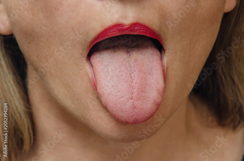 Photos Adult woman with open mouth showing tongue