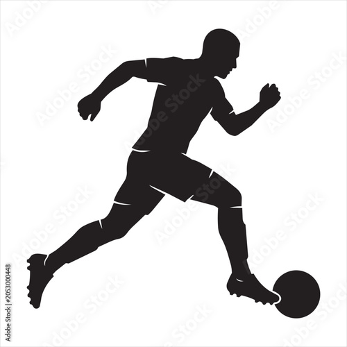 Silhouette of a soccer player running with a ball
