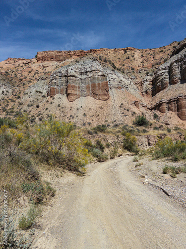 Desert canyon landscape in Granada Geopark with colorful cliffs