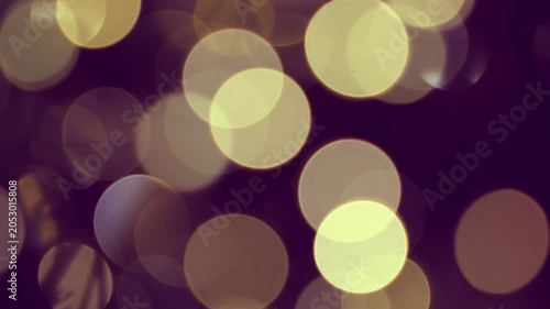 Abstract purple background with defocused blinking lights