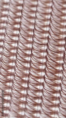 False eyelashes extension set with brown lashes, closeup. Makeup accessories. Vertical footage