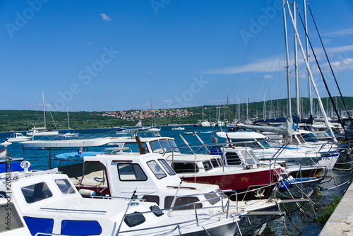Punat Harbor with Boats and View of Krk