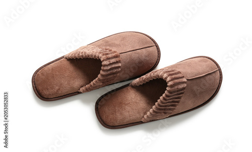 Soft brown slippers on whit...