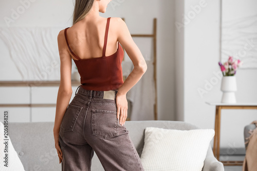 Young woman in stylish brow...