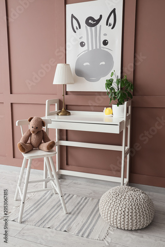 Changing table with chair a...