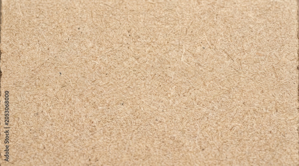 Fototapeta premium Detailed macro view of a brown paper cardboard surface.