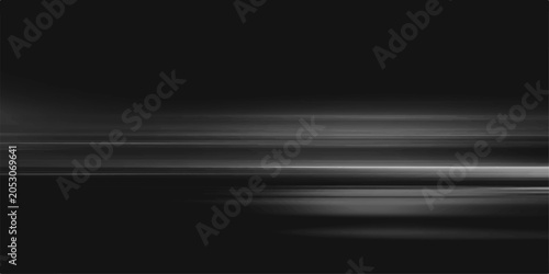 Photography Abstract dark motion blur with horizontal streaks of light against a black background, conveying speed and dynamism