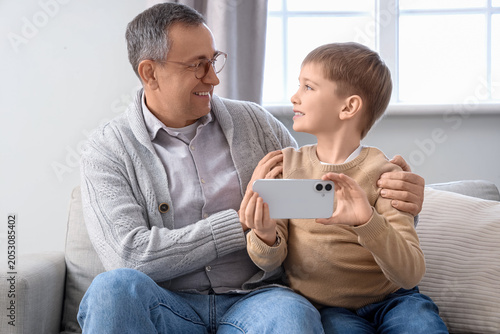 Elderly man and his little ...