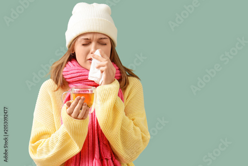 Ill young woman in winter c...