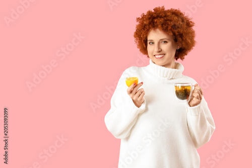Redhead young woman with gl...