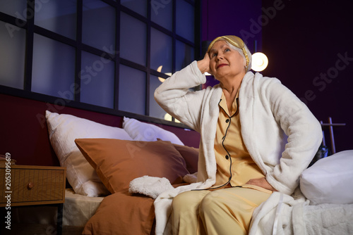 Senior woman suffering from...
