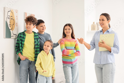 Female guide with children ...