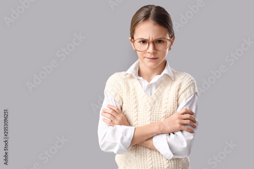 Upset girl hugging herself ...