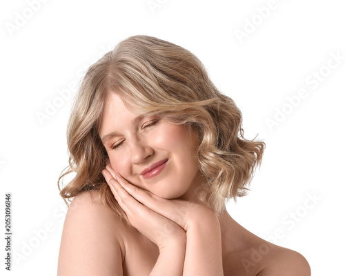 Blonde woman with closed ey...