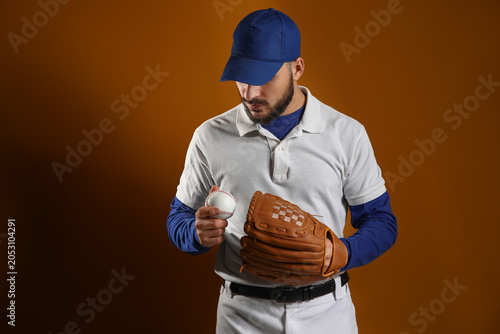 Baseball player in blue cap...
