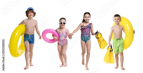 Tableau sur toile Kids in beachwear walking on white background