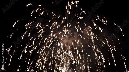 Bright White Fireworks Exploding in a Dark Night Sky, Cascading Sparks and Smoke Trails, Festive Celebration Display, 4K