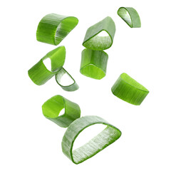 Cut green onion falling on transparent background