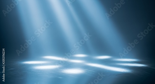 Abstract blue light rays illuminate a dark, smoky floor, creating a mysterious and atmospheric scene perfect for backgrounds or product displays.