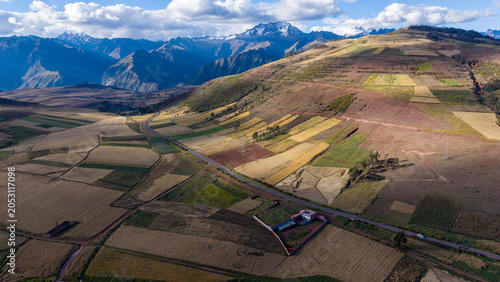Obraz na płótnie Farm Fields and Mountains in the Sacred Valley of Peru During Daylight Hours Wit