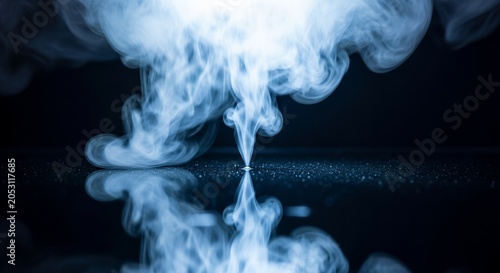 Abstract smoke rising and reflecting on a dark surface, creating a symmetrical and ethereal visual effect.