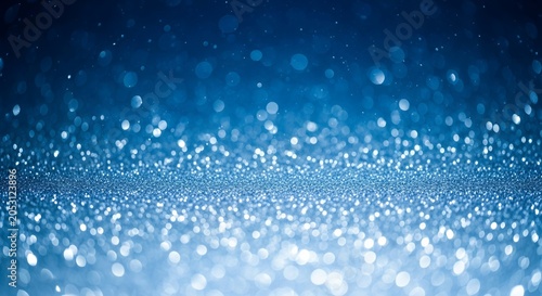 Shimmering Blue Glitter Background with Bokeh Effect and Sparkling Light.