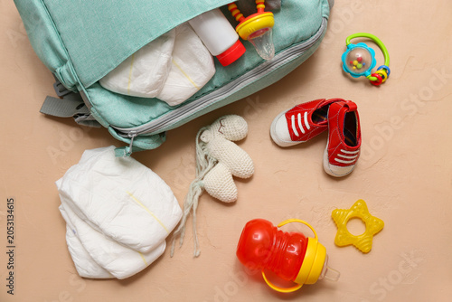 Baby bag with diapers on be...