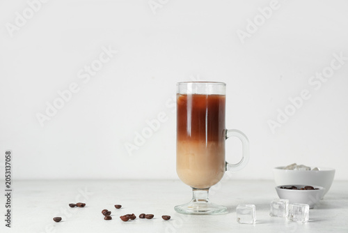 Glass cup of iced latte and...