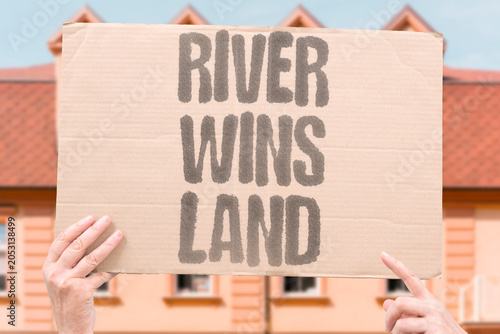 Foto "River wins land" Water reclaims developed area
