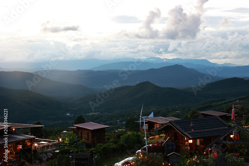 Mountain Resort Village at Sunset with Clouds and sky